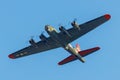 Low angle shot of B-17G flying fortress Texas Raiders in the blue sky Royalty Free Stock Photo