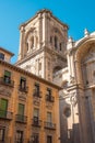 Low angle shot of the baroque bell tower of Granada Cathedral Royalty Free Stock Photo