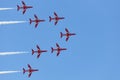 Low angle shot of a beautiful airshow against a bright blue sky