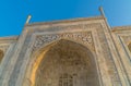 Low angle shot of the beautiful arched entrance walls of the Taj Mahal in Agra, India