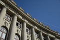 Low angle shot of the beautiful building of the Academy of economy under a clear sky