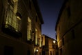 Low angle shot of the beautiful and old buildings captured at night in Chinchon, Spain Royalty Free Stock Photo