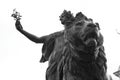 Low angle shot of a beautiful statue of a Roman goddess on a lion