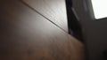 low angle shot of black walnut under tv cabinet