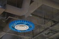 Low angle shot of a blue gear design lamp hanging from a ceiling