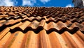 Low angle shot of a brick roof with a cloudy sky background Royalty Free Stock Photo