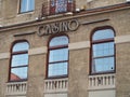 Low angle shot of a building with the CASINO sign on its wall