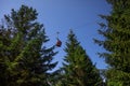 Low angle shot of a cable car from the forest of Ochsenkopf mountain in Fichtelgebirge, Germany