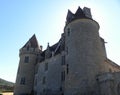 Low angle shot of the Chateau des Milandes during daytime in Castelnaud-la-Chapelle, France