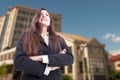 Low angle shot of cheerful female realtor