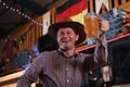 Cowboy drinking beer at the saloon