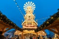 Low-angle shot of the Christmas pyramid in "Rossmarkt" Christmas market in the evening, Frankfurt