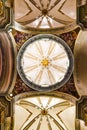 Low angle shot of the classic ceiling dome inside a Cathedral in Villareal, Valencia in Spain