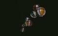 Low-angle shot of colorful paper lantern lights on the black background Royalty Free Stock Photo