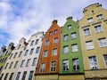 Low angle shot of colorful tenament houses facades in old city of Gdansk, Poland