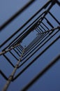 Low angle shot of construction steel bars with a clear blue sky in the background Royalty Free Stock Photo