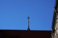 Low angle shot of a cross from the top of a church Royalty Free Stock Photo