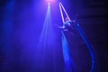 Low angle shot of a dancer performing a quixotic aerial dance at concert in Kansas City