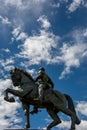 Low-angle shot of the Equestrian Statue of Simon Bolivar against a blue cloudy sky