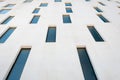 Low angle shot of a facade of a high white building