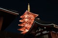 Low angle shot of a Five-Storied Pagoda illuminated at night in Tokyo, Japan Royalty Free Stock Photo