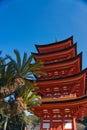 Low-angle shot of the five-storied pagoda on Miyajima Island. Hatsukaichi, Japan. Royalty Free Stock Photo