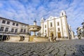 Giraldo Square with fountain and Saint Anton`s church, Evora, Al