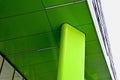 Low Angle Shot of a green sustaining pillar of the building facade