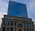 Low-angle shot of Hapag Lloyd building with a blue sky in the background in Valparaiso, Chile