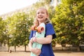 Cute young girl with pennyboard outdoors Royalty Free Stock Photo