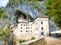 Low angle shot of the historic fortress in the mountains of Postojna, Slovenia