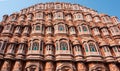 Low-angle shot of the iconic Hawa Mahal in Jaipur, India, featuring detailed architectural elements