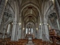 Low angle shot of the inside of a typical historical Christian church in France
