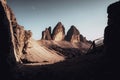 Low angle shot of Jutting rock formations under the clear blue sky