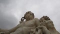 Low-angle shot of the Le Nil statue by Lorenzo Ottone in Paris, France