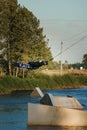 Low angle shot of man wakeboarding on a lake. Man water skiing at sunset. Royalty Free Stock Photo