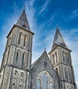 Low angle shot of the Maredsous Abbey monastery against a beautiful blue sky in Anhee, Belgium