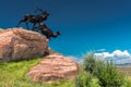 Low angle shot of metal deer sculptures on a rock in Jackson, Wyoming, USA Royalty Free Stock Photo