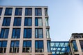 Low angle shot of modern building exterior against a cloudy blue sky in Dusseldorf Royalty Free Stock Photo