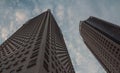 Low angle shot of modern glass city buildings with sky background..Common modern business skyscrapers, high-rise buildings, archit Royalty Free Stock Photo