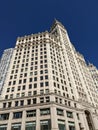 Low angle shot of a modern white building with blue sky in the background, Chicago, Illinois Royalty Free Stock Photo