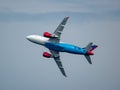 Low angle shot of OM-BYA plane flying in the sky at an air show in Slovakia