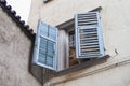 Low angle shot of an open window in Italy Royalty Free Stock Photo