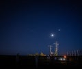 Low angle shot of pace X satellites in the night sky captured in Bucharest, Romania Royalty Free Stock Photo