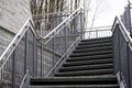 Low Angle Shot Of A Public Stairs With Metal Fence Outside In The Daylight