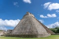 Low angle shot of the Pyramid of the Magician Uxmal in Mexico under a blue sky Royalty Free Stock Photo