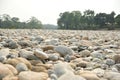 Low angle shot of rocks near Murti River in West Bengal, India