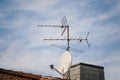 Low angle shot of a rooftop satellite