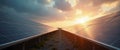 Long row of solar panels in field under dramatic sunset sky, renewable energy Royalty Free Stock Photo