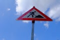 Low angle shot of a signpost on a blue sky background Royalty Free Stock Photo